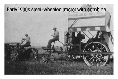 tractor with combine in early 1900s