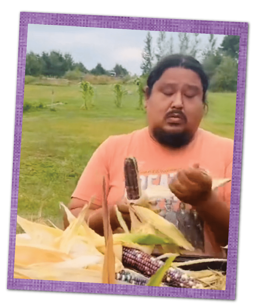 luke is shucking the corn