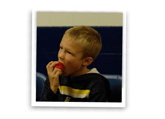 boy eating an apple