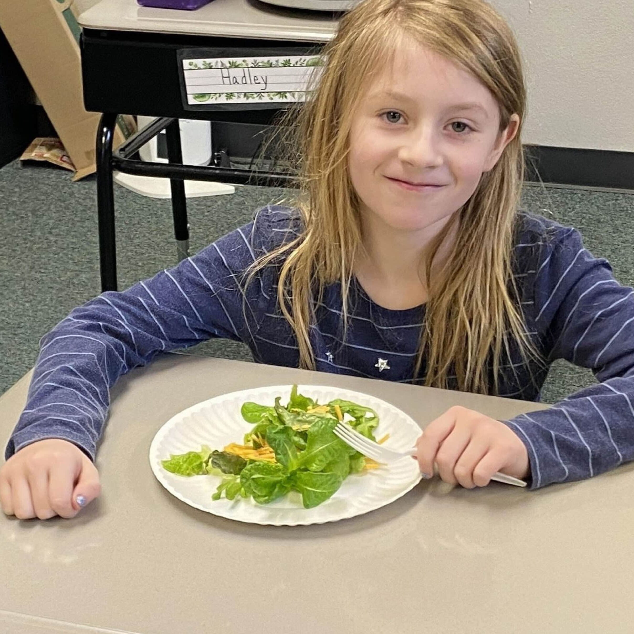 Elementary Student with Plate of Salad